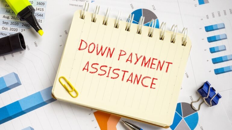 Financial concept about Down Payment Assistance with phrase on the piece of paper.